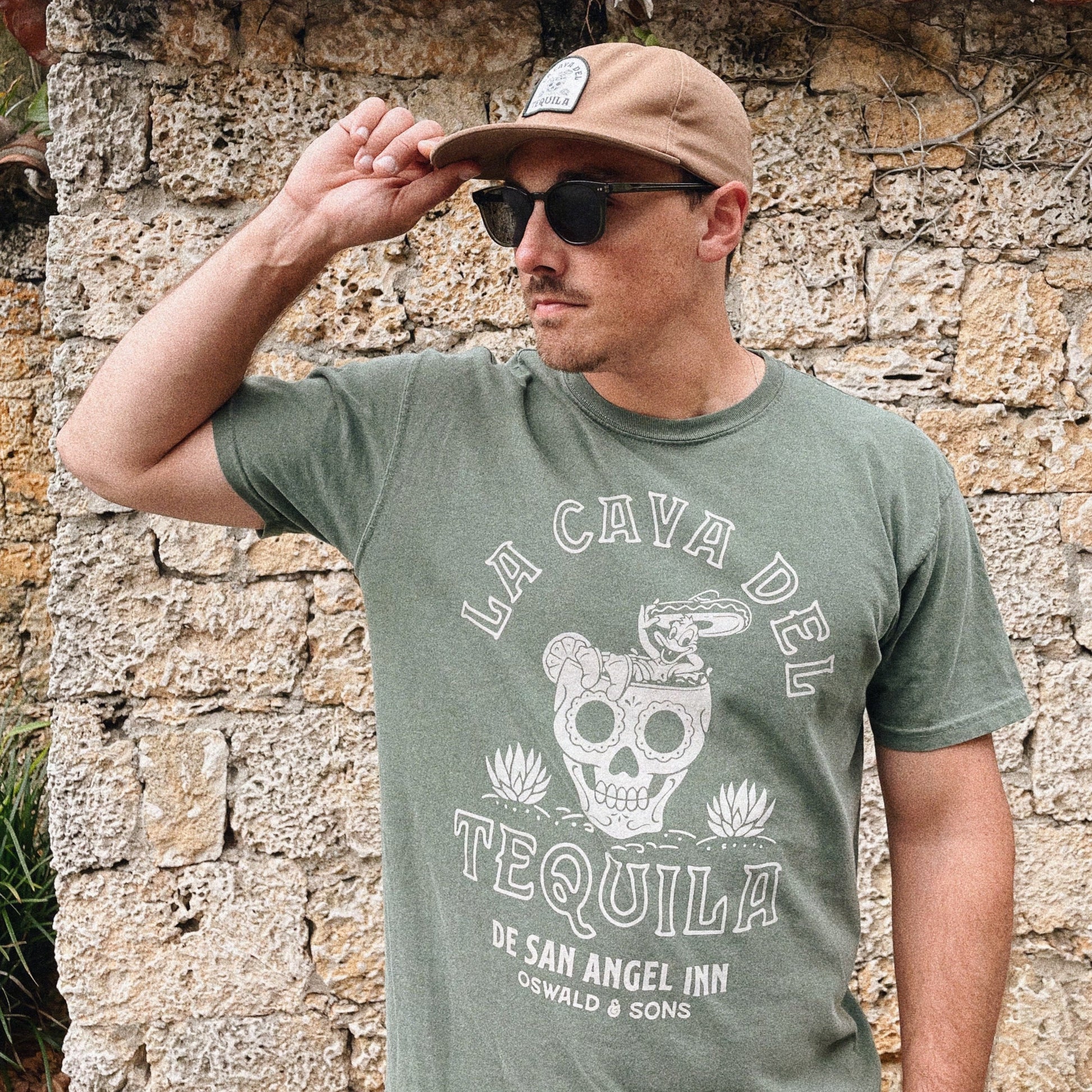 A man wearing showcasing La Cava del Tequila vintage design T-Shirt